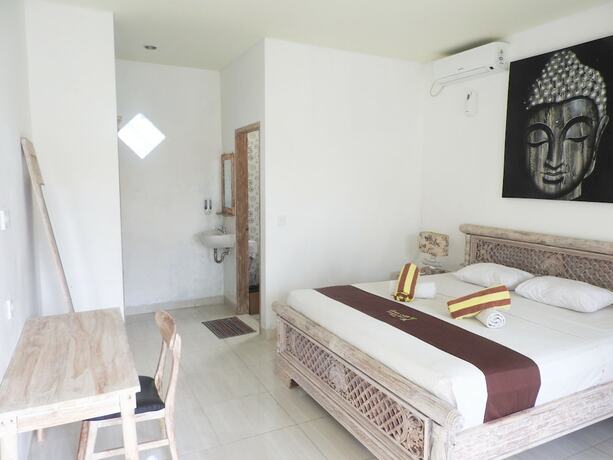 Imagen de la habitación del Hotel Taman Asih Bingin Homestay. Foto 20