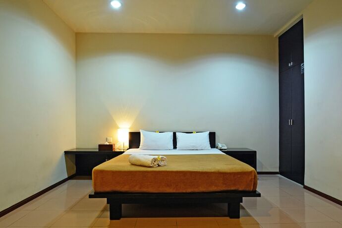 Imagen de la habitación del Hotel Taman Ayu Townhouse. Foto 11