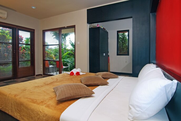 Imagen de la habitación del Hotel Taman Ayu Townhouse. Foto 14