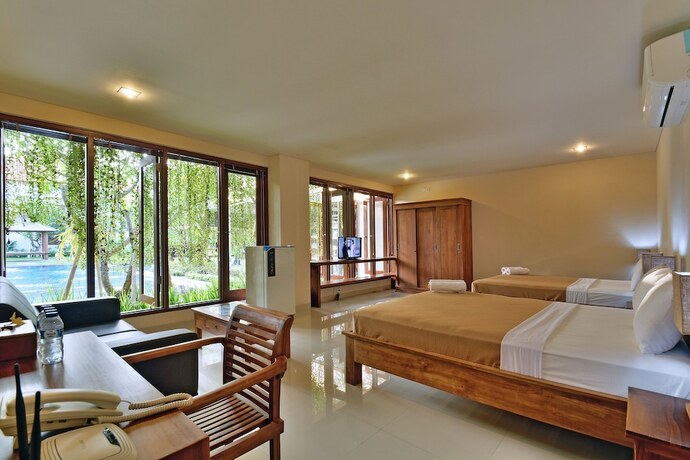Imagen de la habitación del Hotel Taman Ayu Townhouse. Foto 15