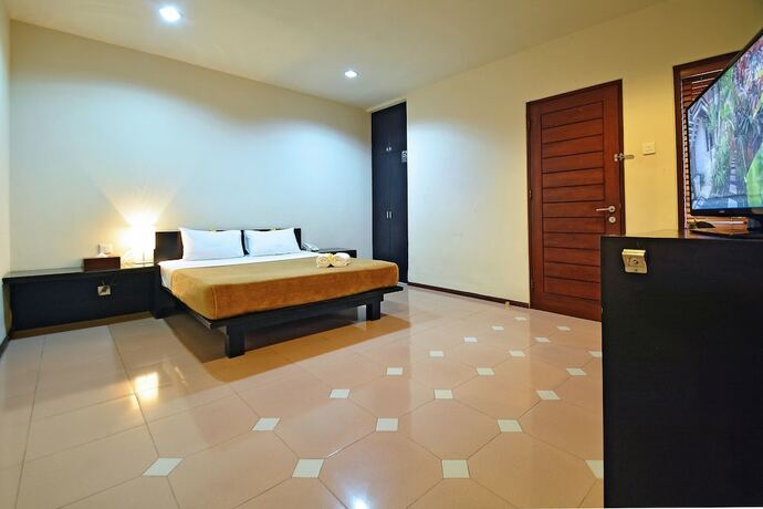 Imagen de la habitación del Hotel Taman Ayu Townhouse. Foto 17