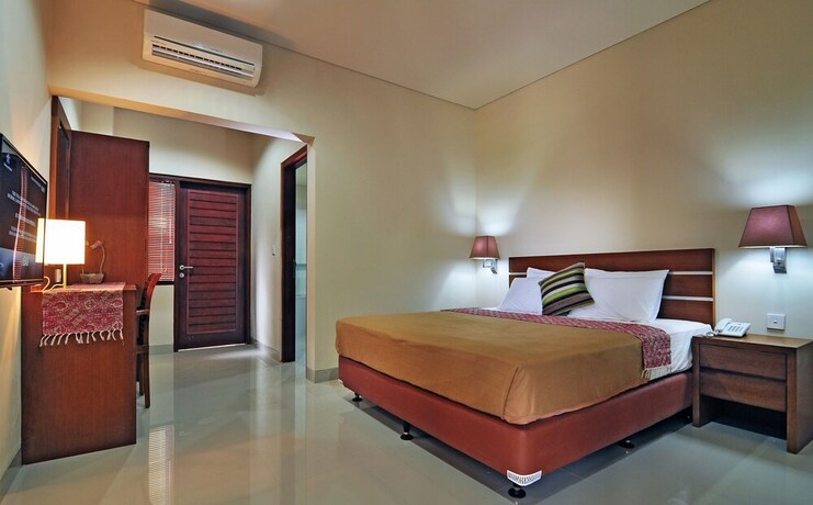 Imagen de la habitación del Hotel Taman Ayu Townhouse. Foto 18