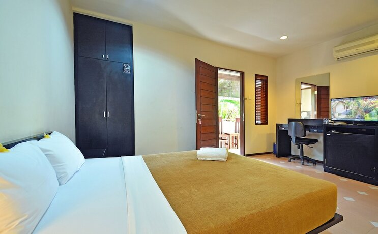Imagen de la habitación del Hotel Taman Ayu Townhouse. Foto 20
