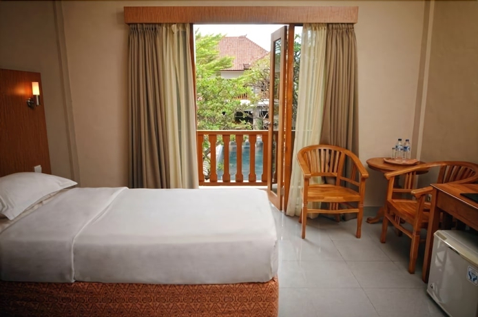 Imagen de la habitación del Hotel Taman Rosani. Foto 10