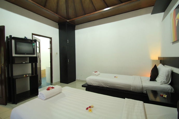 Imagen de la habitación del Hotel Taman Sari Cottages 2. Foto 2