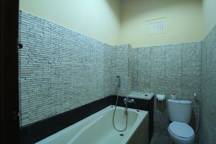 Imagen de la habitación del Hotel Taman Sari Cottages 2. Foto 7