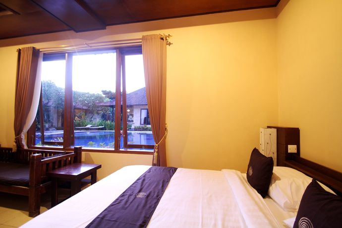 Imagen de la habitación del Hotel Taman Sari Cottages 2. Foto 11