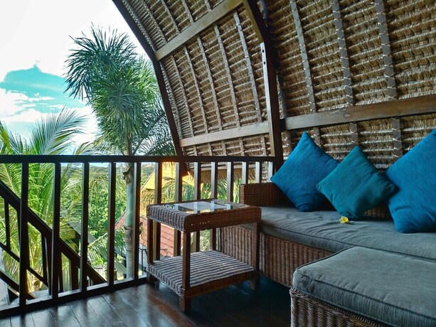 Imagen de la habitación del Hotel Taman Sari Uluwatu. Foto 2