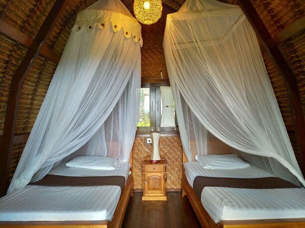 Imagen de la habitación del Hotel Taman Sari Uluwatu. Foto 3