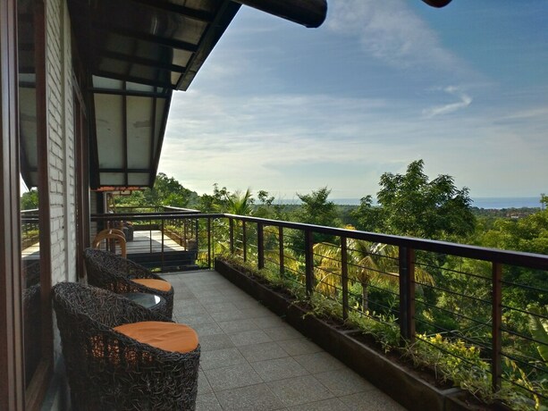 Imagen de la habitación del Hotel Taman Sari Uluwatu. Foto 4
