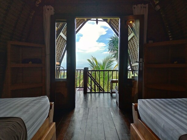 Imagen de la habitación del Hotel Taman Sari Uluwatu. Foto 5