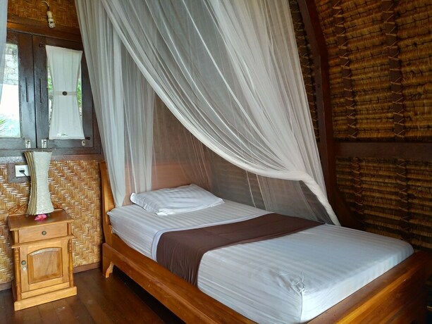 Imagen de la habitación del Hotel Taman Sari Uluwatu. Foto 6