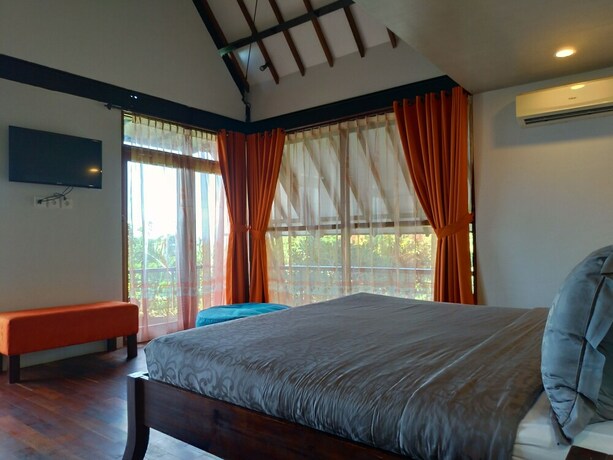 Imagen de la habitación del Hotel Taman Sari Uluwatu. Foto 7