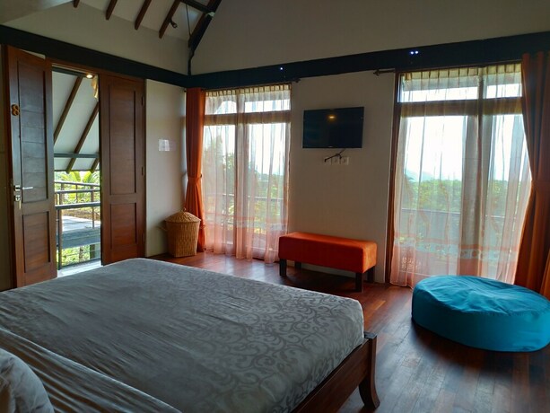 Imagen de la habitación del Hotel Taman Sari Uluwatu. Foto 9