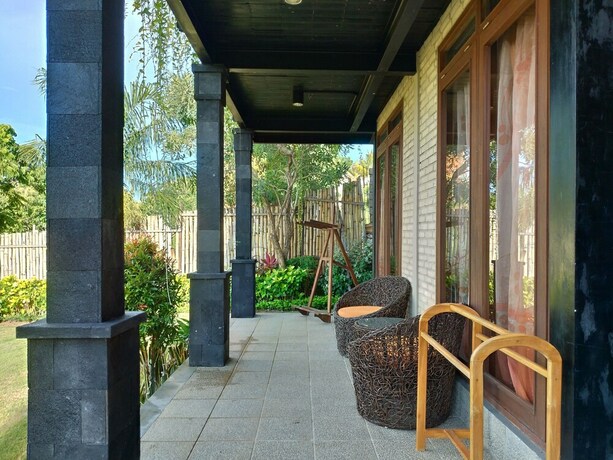 Imagen de la habitación del Hotel Taman Sari Uluwatu. Foto 12