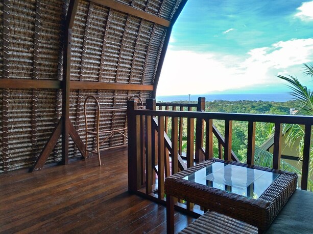 Imagen de la habitación del Hotel Taman Sari Uluwatu. Foto 13
