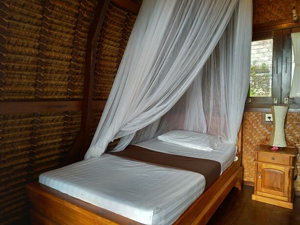 Imagen de la habitación del Hotel Taman Sari Uluwatu. Foto 16