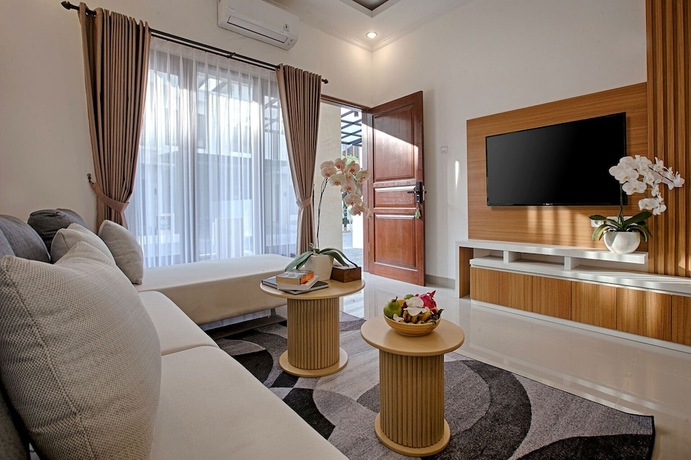 Imagen de la habitación del Hotel Taman Seminyak Suites. Foto 4