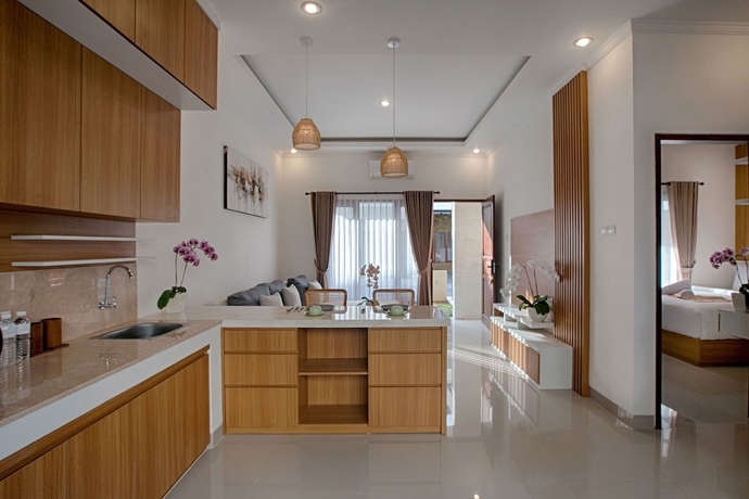 Imagen de la habitación del Hotel Taman Seminyak Suites. Foto 5