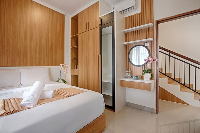 Imagen de la habitación del Hotel Taman Seminyak Suites. Foto 9