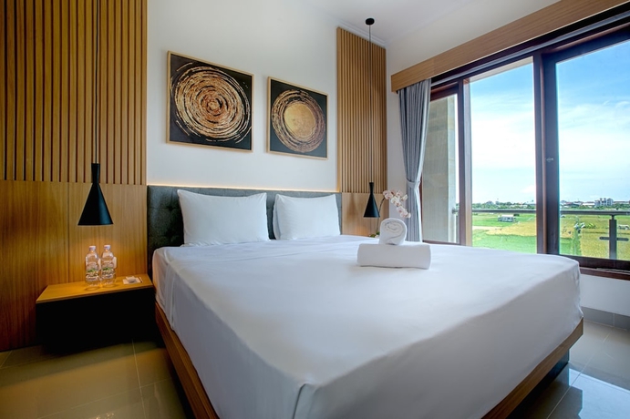 Imagen de la habitación del Hotel Taman Seminyak Suites. Foto 10