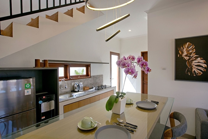Imagen de la habitación del Hotel Taman Seminyak Suites. Foto 16