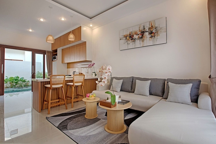 Imagen de la habitación del Hotel Taman Seminyak Suites. Foto 18