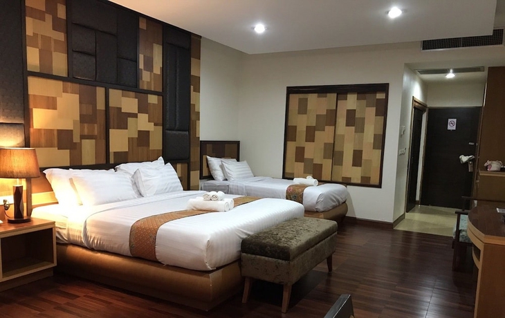 Imagen de la habitación del Hotel Taman Spa Resort. Foto 5