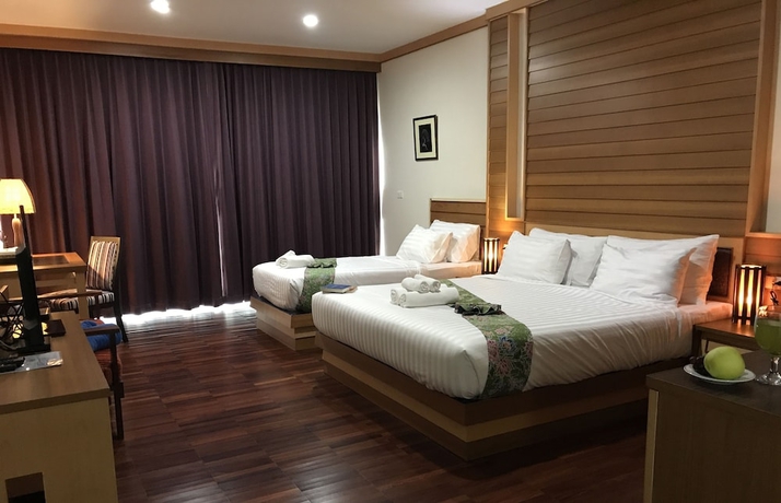 Imagen de la habitación del Hotel Taman Spa Resort. Foto 7