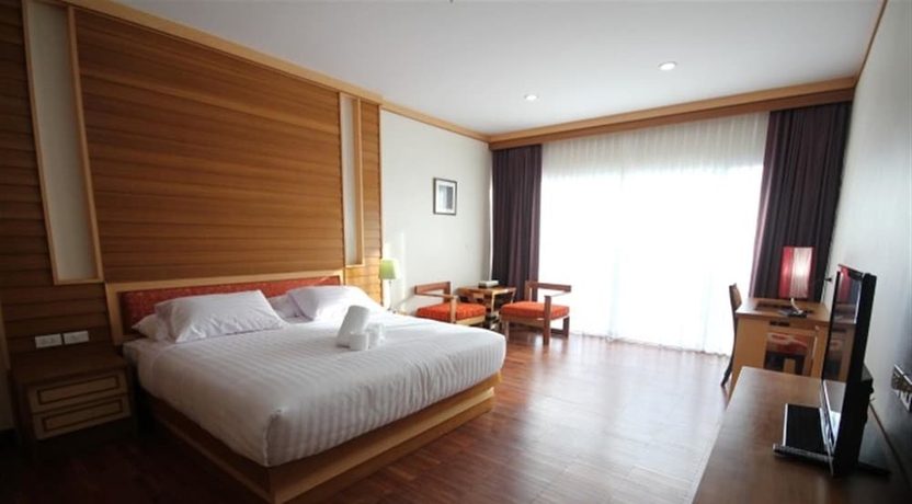Imagen de la habitación del Hotel Taman Spa Resort. Foto 11