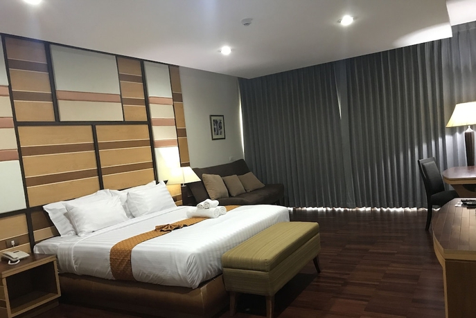 Imagen de la habitación del Hotel Taman Spa Resort. Foto 12