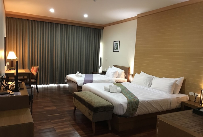 Imagen de la habitación del Hotel Taman Spa Resort. Foto 14