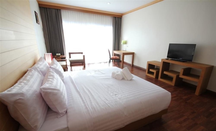 Imagen de la habitación del Hotel Taman Spa Resort. Foto 15