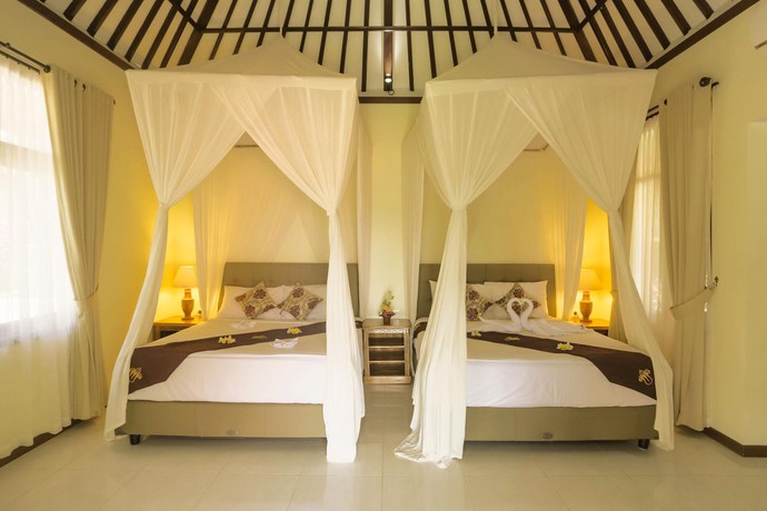 Imagen de la habitación del Hotel Taman Surgawi Resort and Spa. Foto 5