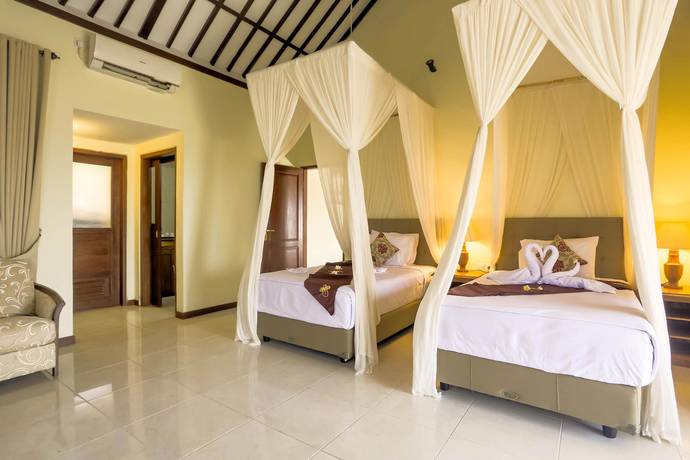 Imagen de la habitación del Hotel Taman Surgawi Resort and Spa. Foto 7