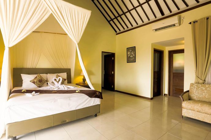 Imagen de la habitación del Hotel Taman Surgawi Resort and Spa. Foto 8