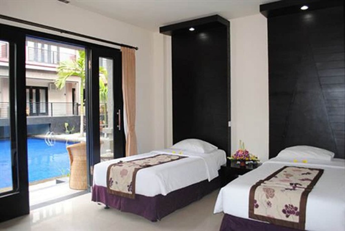 Imagen de la habitación del Hotel Taman Tirta Ayu. Foto 19