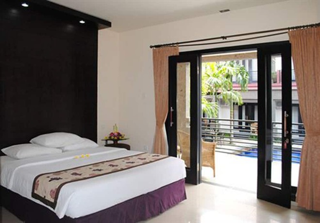Imagen de la habitación del Hotel Taman Tirta Ayu. Foto 20