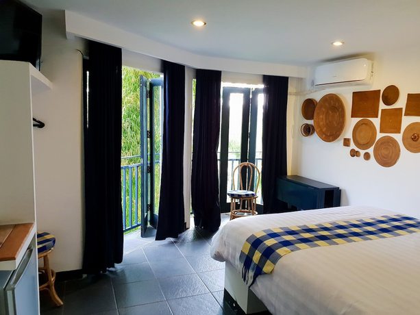 Imagen de la habitación del Hotel Taman Unique. Foto 10