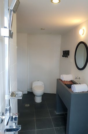 Imagen de la habitación del Hotel Taman Unique. Foto 12