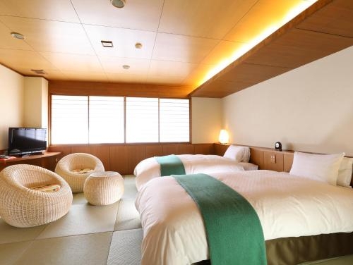 Imagen de la habitación del Hotel Tamanoyu, Matsumoto. Foto 7