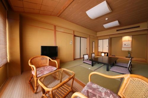 Imagen de la habitación del Hotel Tamanoyu, Matsumoto. Foto 10