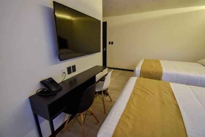 Imagen de la habitación del Hotel Tamara, Centro Hist&oacute;rico de Puebla. Foto 11