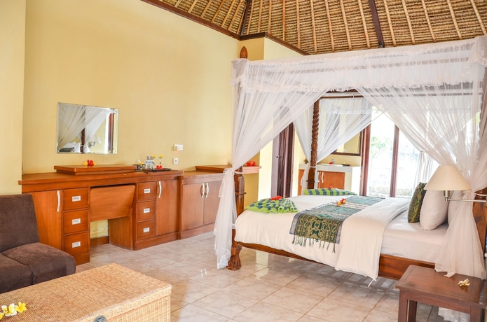 Imagen de la habitación del Hotel Tamarind Beach Bungalows. Foto 2