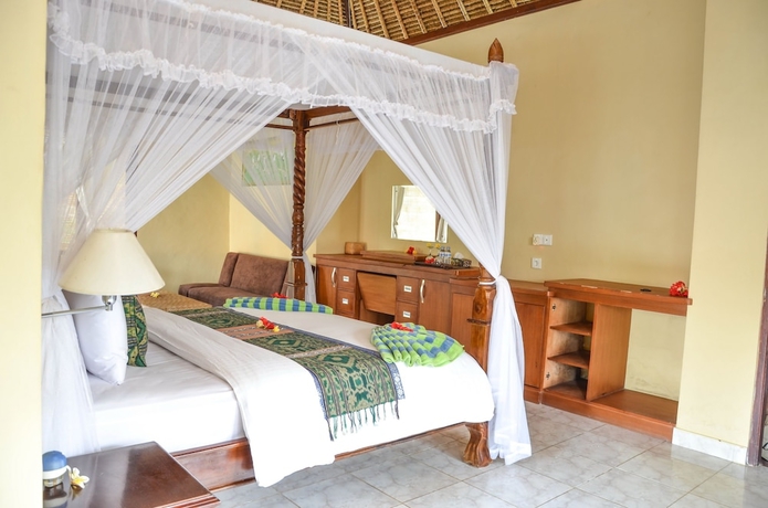 Imagen de la habitación del Hotel Tamarind Beach Bungalows. Foto 5