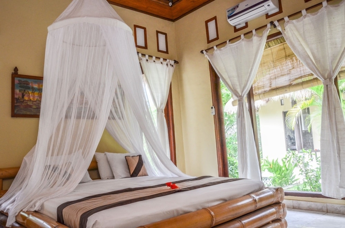 Imagen de la habitación del Hotel Tamarind Beach Bungalows. Foto 6