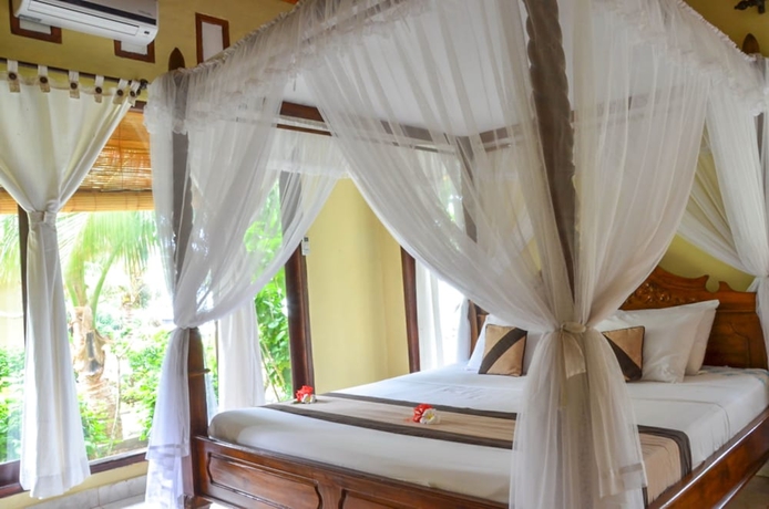 Imagen de la habitación del Hotel Tamarind Beach Bungalows. Foto 7