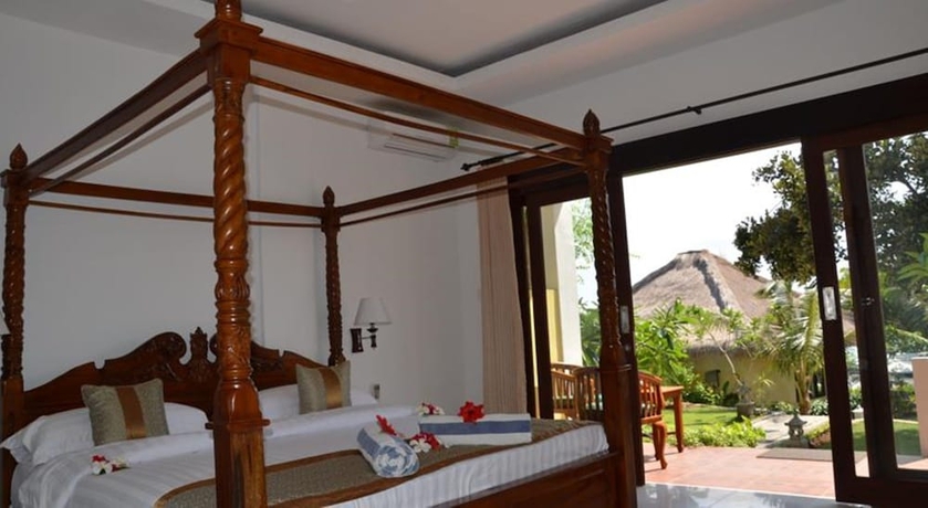Imagen de la habitación del Hotel Tamarind Beach Bungalows. Foto 13