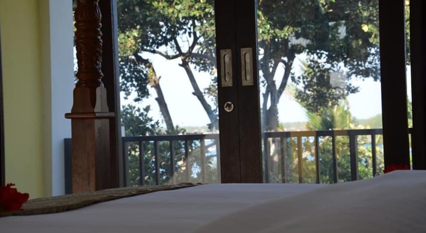 Imagen de la habitación del Hotel Tamarind Beach Bungalows. Foto 17