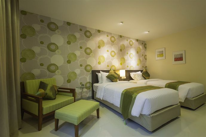 Imagen de la habitación del Hotel Tamarind Garden. Foto 9